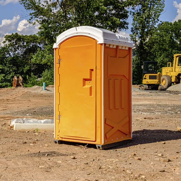 what is the cost difference between standard and deluxe portable restroom rentals in Harrellsville NC